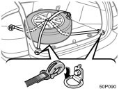 Toyota Prius: Stowing flat tire. 4. Attach the other ends of the beltsto the rear tie−down hooks.